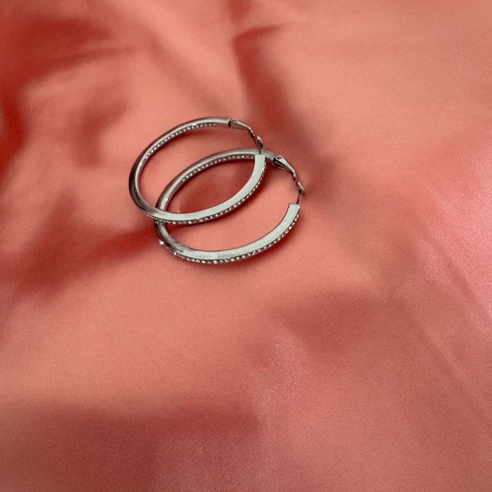 Elegant Silver Hoop Earrings with rhinestones.